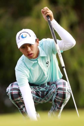 Fourteen-year-old Chinese golfer Guan Tianlang.