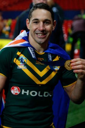 Dream return: Billy Slater with his winners' medal.  The fullback came back from injury to score two tries in the 34-2 win over New Zealand.