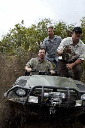Shawn Heflick, Michael Cole and Greg Graziani terrorise snakes in <i>Python Hunters</i>.
