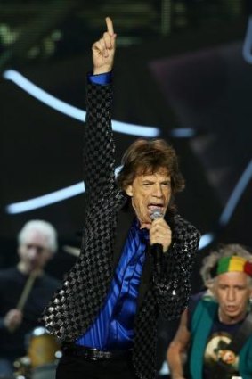 Full voice: Mick Jagger is back in action after a throat infection.