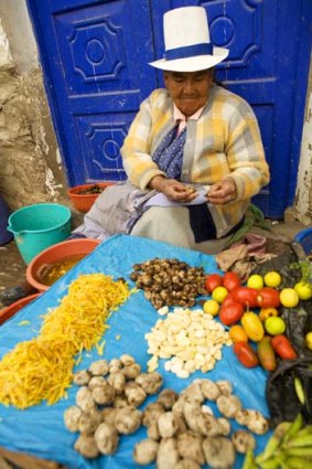A vendor at Pisac Market, Cusco.
