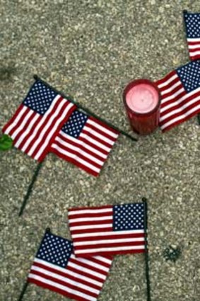 Seven US flags represent the astronauts lost in the space shuttle Columbia disaster.