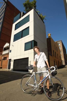 On your bike ... Eoghan Lewis from Sydney Architectural Walks at Domenic Alvaro's clever Surry Hills home.