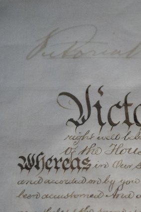 The Royal Commission of Assent signed by Queen Victoria on 9 July 1900 made Australia's constitution law. Her faded signature at the top of the document has never been retouched and must be limited to light exposure.    