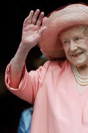 The royal wave ... the Queen Mother acknowledges wellwishers in 2000.