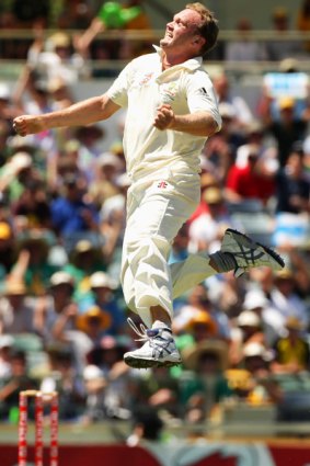 Doug Bollinger celebrates a five-wicket haul at the WACA Ground yesterday.