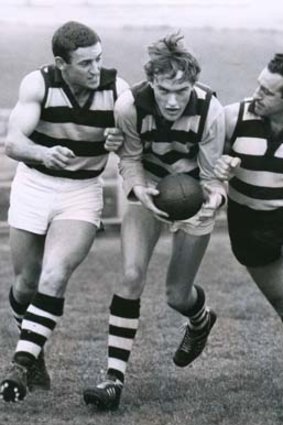 Geelong's Ian Nankervis is put through a fitness test by Tony Polinelli and coach Peter Pianto (right) in 1968.