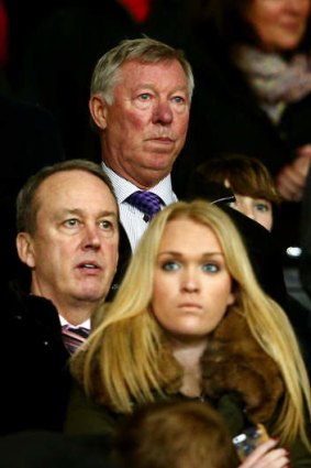 Grim watching: Former Manchester United manager Sir Alex Ferguson looks on from the stands.