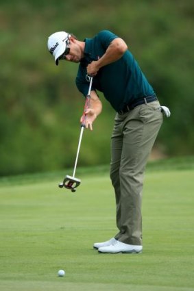 Broom service: Adam Scott had mixed success with "that" putter during the first round of the PGA Championship.