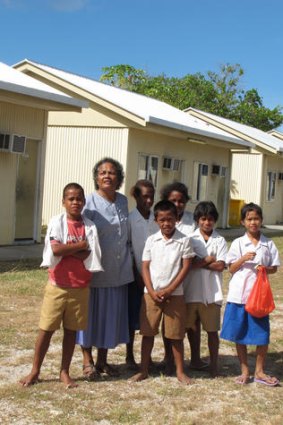 Nauru's new president still supports reopening detention centres. Principal Jocelyn Adam and students are pictured here at one decommissioned site.