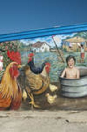 A mural at a convenience store near Mission Concepcion.
