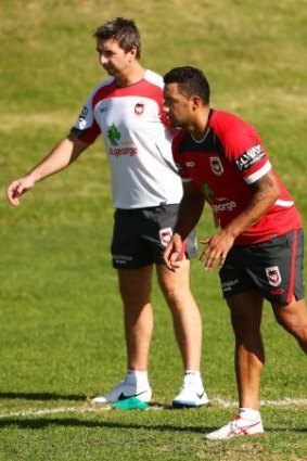 Dragons coach Steve Price watches Benji Marshall take part in a defensive drill last week.