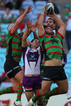 Up an' at 'em ... Souths forward Dave Taylor gathers a kick to score his disallowed try yesterday.