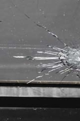 Bullet hole ... the cash-in-transit van was allegedly fired at.