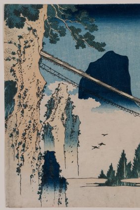 Katsushika Hokusai's The suspension bridge on the border of Hida and Etchu Provinces (Hietsu no sakai Tsuribashi) from the Remarkable views of bridges in various provinces (Shokoku meikyo kiran) series.  