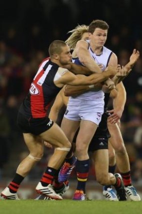 Patrick Dangerfield, seen here getting a handball away against Essendon, is expected to be fit to play against Port Adelaide.