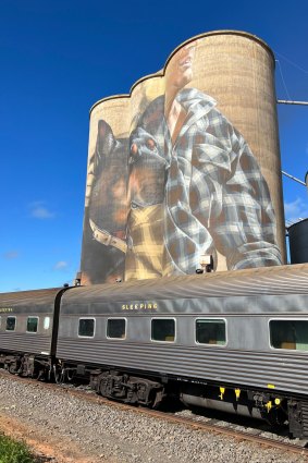 Smug's work in Nullawil depicts a local farmer in checked shirt with his loyal kelpie next to him.