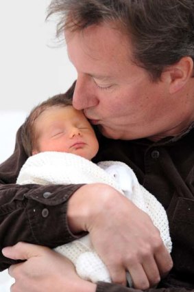 "Unbelievably beautiful" ...David Cameron with his daughter Florence Rose Endellion, born last week in Cornwall.