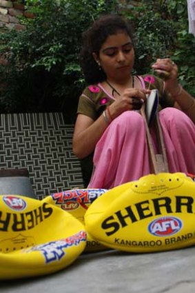 Ruby skips school to stitch footballs for a few cents each.