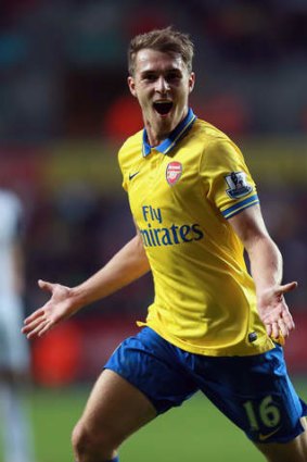 Jubilant: Arsenal's Aaron Ramsey after scoring his side's second goal against Swansea City.