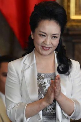 Turning on the charm: Chinese First Lady Peng Liyuan.