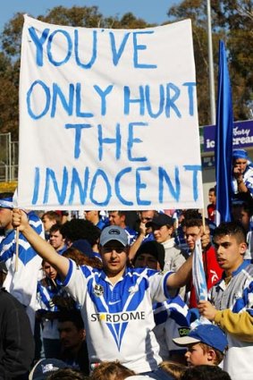 Cheated ... Bulldogs Fans reacted angrily after Gallop docked the Bulldogs 37 competition points and imposed a $500,000 fine in 2002 for the club's $1 million salary cap breach. Instead of challenging for a premiership, the Bulldogs finished bottom of the ladder.