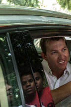 Embracing the culture … Brett Lee takes to the streets in India.