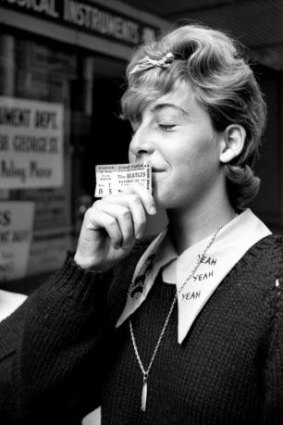 A fan with a ticket to the Beatles concert at Sydney Stadium during the Sydney leg of their Australian tour, 16 June 1964.
