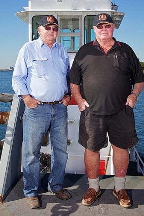 Tugboat skippers Doug Hislop and Peter Fenton risked their lives to prevent a potential catastrophe on the raging Brisbane River during the flood crisis.