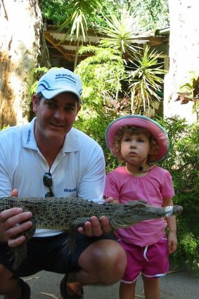 Day 2 winner: Jane Milne sent us a picture of her husband and daughter with a small croc. The look on her daughter's face is fearless.