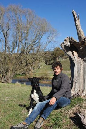 Tim Cope with his dog, Tigon.