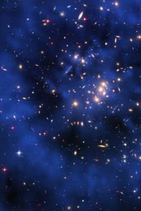 Mystery &#8230; a Hubble telescope composite image shows a ghostly ring of dark matter in a galaxy cluster.