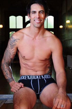Model performer ... Mitchell Johnson is a happy cricketer on and off the field.