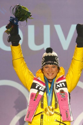 Maria Riesch of Germany celebrates winning the gold.