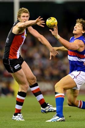 Up for grabs: St Kilda's Ben McEvoy (left) and Bulldog Will Minson vie for the ball at Etihad Stadium.