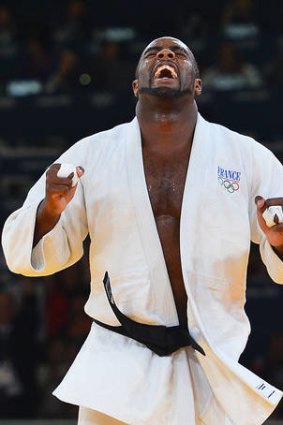 Teddy Riner celebrates after winning his fight against Alexander Mikhaylin.