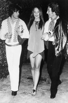 Fashion  photographers Lord Patrick Lichfield, right, and David Bailey, escort model Penelope Tree at a fashion show in Capri.