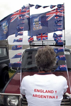 A man wearing a t-shirt in support of the Falklands remaining a part of the United Kingdom.