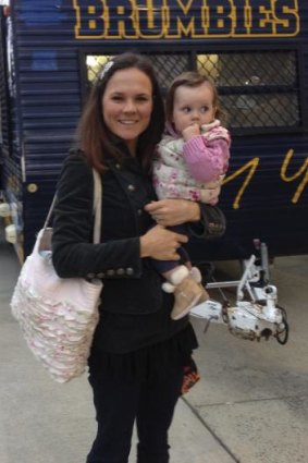 Louise McVerry with daughter Lucy at a Brumbies game in 2014.