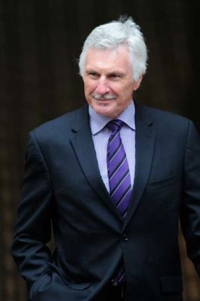 Smiling all the way to the job: Mick Malthouse attending a luncheon on Thursday.