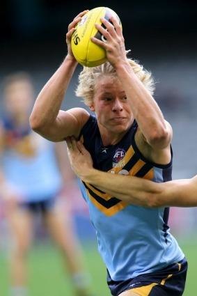 Isaac Heeney shows his style for NSW/ACT, which won the second division title on Wednesday.
