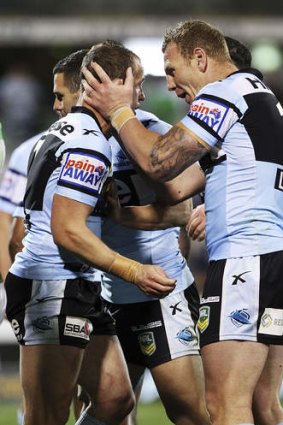 Too strong: A depleted Sharks proved too hot for the Raiders to handle.