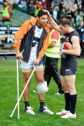 Fighting back: Giant Setanta O'hAilpin, with former Carlton teammate Heath Scotland, has returned from a knee injury.