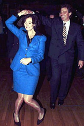 Tony Blair, the then UK Opposition Leader, and his wife Cherie hit the dance floor in 1996.