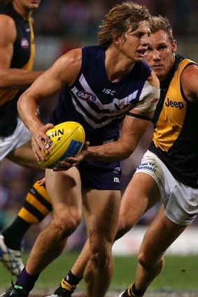 Docker Nathan Fyfe looks for a teammate to pass the ball.