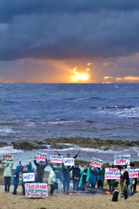 Save Bastion Point activists rally against construction of a road, car park, boat ramp and breakwater.