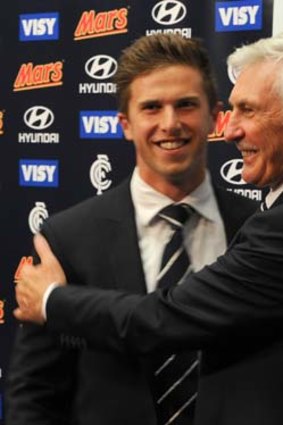 All smiles: Carlton coach Mick Malthouse and captain Marc Murphy.