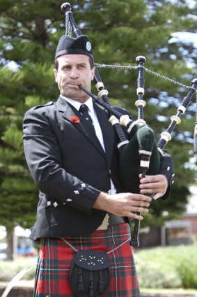 Geoff Shaw playing the bagpipes on Remembrance Day 2011.