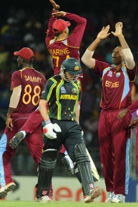 High 10: West Indies players celebrate George Bailey's dismissal.