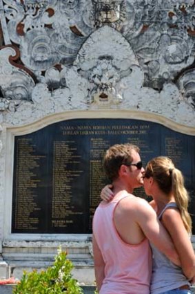 Looking back ... Stacey and Michael Curtis before the Bali bombing memorial in Kuta.
